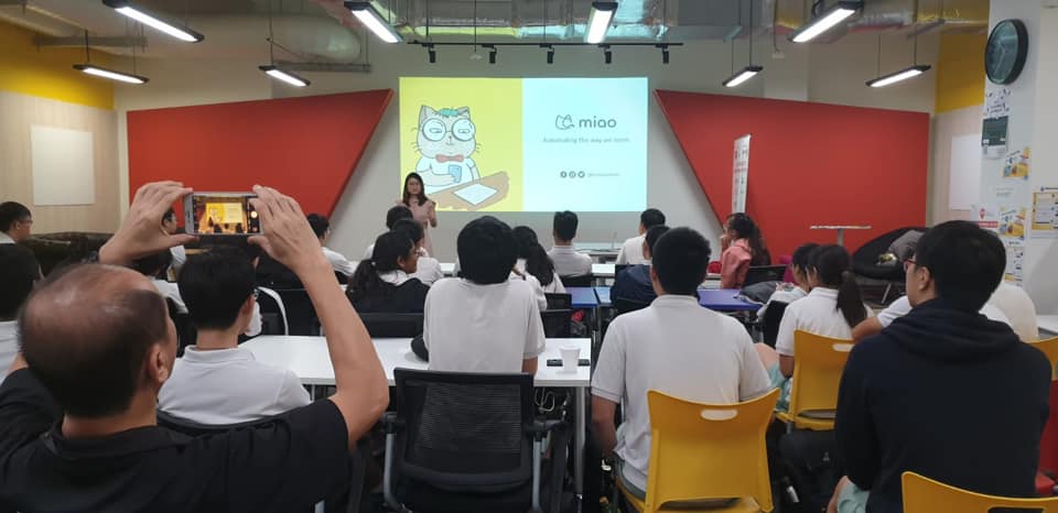 Miao is with students from  NUS High School of Mathematics & Science